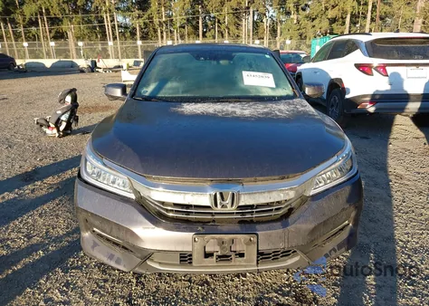 2017 Honda Accord Hybrid Touring z USA, uszkodzony, nr VIN JHMCR6F77HC031507